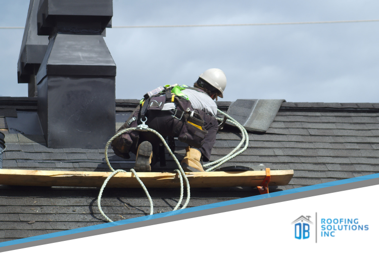 roofer making roof repairs on a home in Meadow Vista, CA.