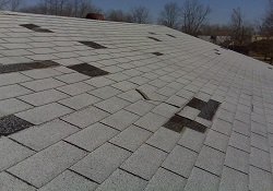 Roof damage that needs Meadow Vista roofing repairs.